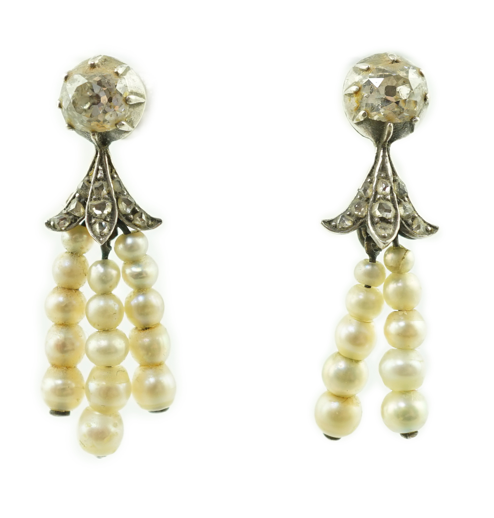 A pair of antique gold, graduated seed pearl, cushion and rose cut diamond set tassel drop earrings